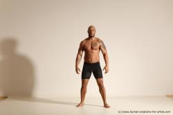 Underwear Gymnastic poses Man Black Muscular Bald Dancing Dynamic poses Academic